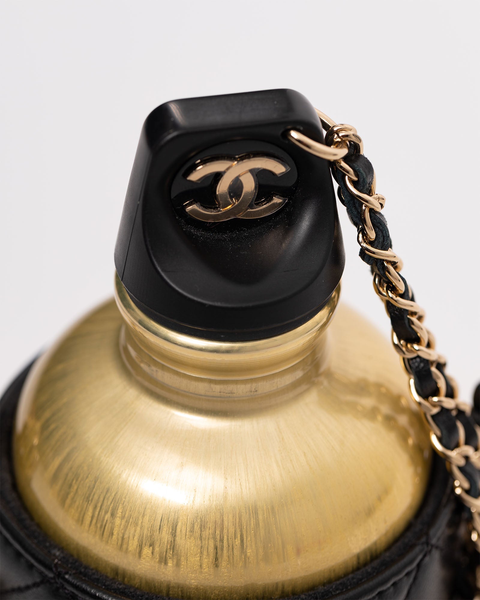 CHANEL Metal Flask Bag in Gold and Black Quilted Lambskin Leather Case